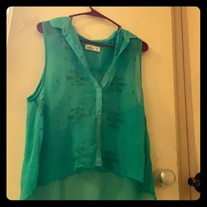Loose fitting and sheer teal button down